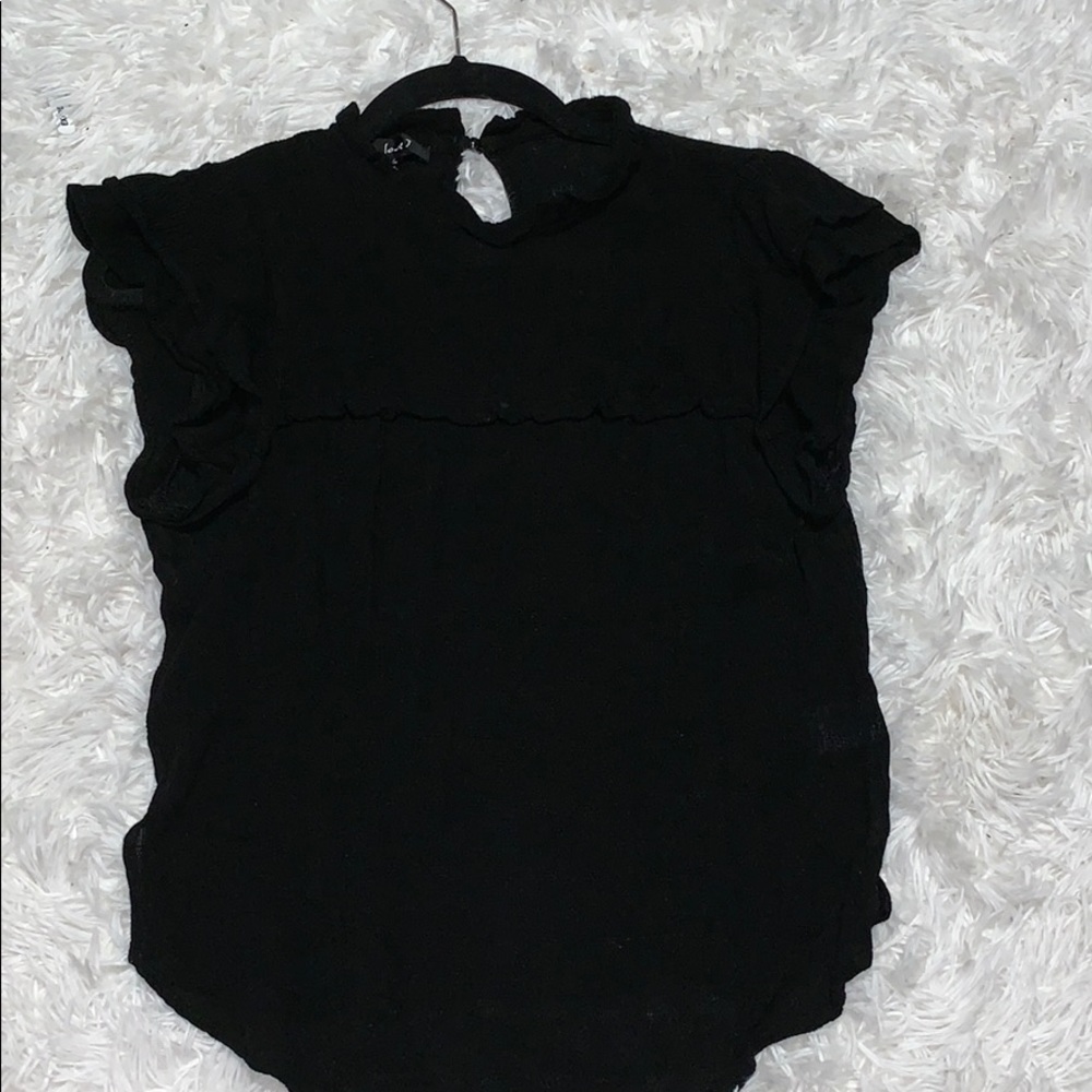 Black ruffle shirt